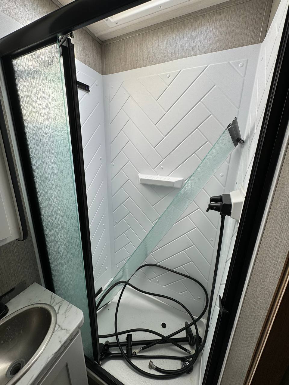 Replacing retractable shower door in RV