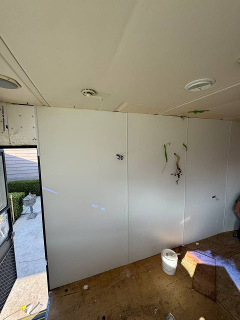 White laminated plywood installation in RV