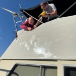 Vinyl wrapping the boat