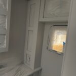 cabinets paint white in fireplace in Thor Windsport Motorhome