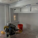 cabinets painting in fireplace in Thor Windsport Motorhome
