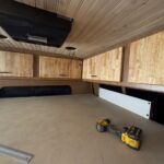 Bed with electric lift mechanism installation