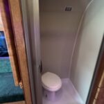 Ford Econoline van interior toilet installation