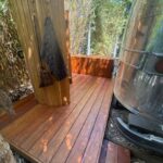 deck behind airstream trailer with shower 1