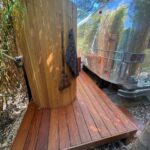 deck behind airstream trailer with shower 2