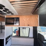 Upper cabinet above bench with light underneath