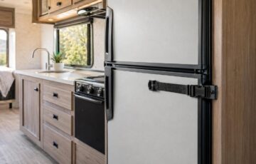 How to keep rv refrigerator door closed while traveling?