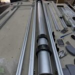 Custom RV Electric Bed Lift System Above the Cab frame