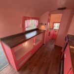 Vintage Airstream Renovation to pink lounge